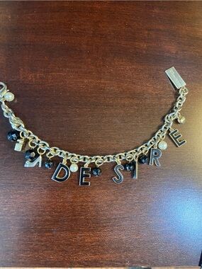 Dolce and Gabana Desire charm bracelet with black and pearl accents